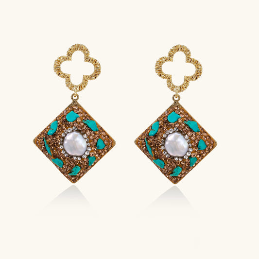 Gold-plated drop earrings with quatrefoil studs, diamond-shaped pendants featuring baroque pearls, turquoise stones, and amber crystals