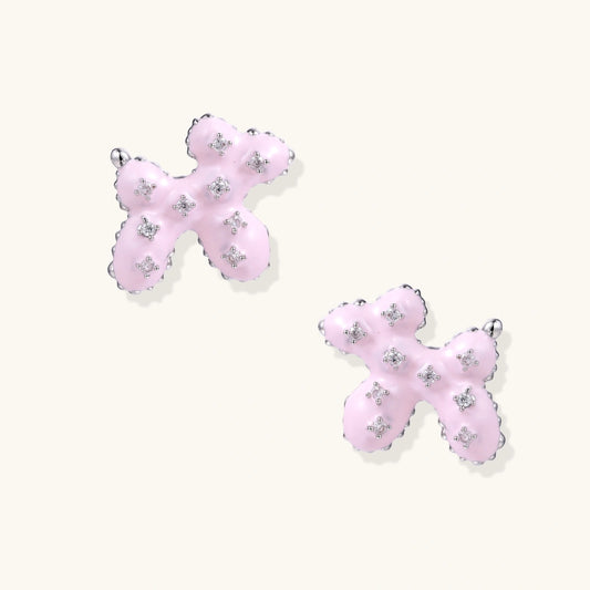 Glossy pink enamel balloon dog stud earrings with crystal details on white gold plated brass, museum-inspired design