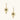 Gold angel wing drop earrings with black heart-shaped zirconia center and twisted posts on beige background