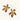 Gold-plated brass flower earrings with brown tortoiseshell enamel petals on cream background
