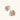 Artistic monstera-shaped earrings with teal, coral, and cream enamel brushstrokes, gold trim, and white pearl accent