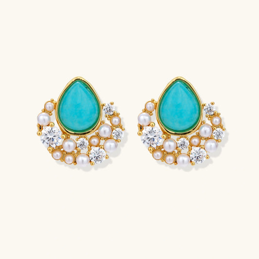 Gold-plated cluster earrings with teardrop turquoise stones surrounded by white pearls and clear crystals