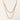 Layered gold chain necklace with organic baroque freshwater pearls and adjustable length on cream background