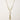 Long gold-plated necklace with freshwater pearls, chunky chain links, and flowing tassel pendant