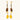 Gold-plated dangle earrings with brown gemstones, star charms, and yellow amber drops on cream background.