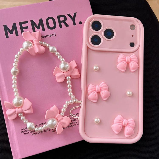 Soft Silicone 3D Bowknot Pearl Phone Case with Beaded Wrist Strap, For iPhone 17 Pro Max, For iPhone 17 Pro, For iPhone 17, For iPhone Air, For iPhone 16 Pro Max, For iPhone 16 Pro, For iPhone 16, For iPhone 15 Pro Max  For iPhone 17 Pro Max / Pink