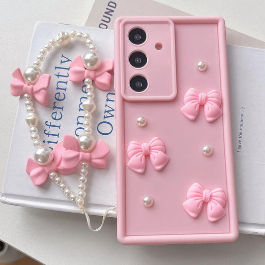 Soft Silicone 3D Bowknot Pearl Phone Case with Beaded Wrist Strap, For Samsung Galaxy A56 5G, For Samsung Galaxy A26 5G, For Samsung Galaxy A36 5G, For Samsung Galaxy A16 4G / 5G, For Samsung Galaxy A15 / 5G, For Samsung Galaxy A55 5G  For Samsung Galaxy A56 5G / Pink